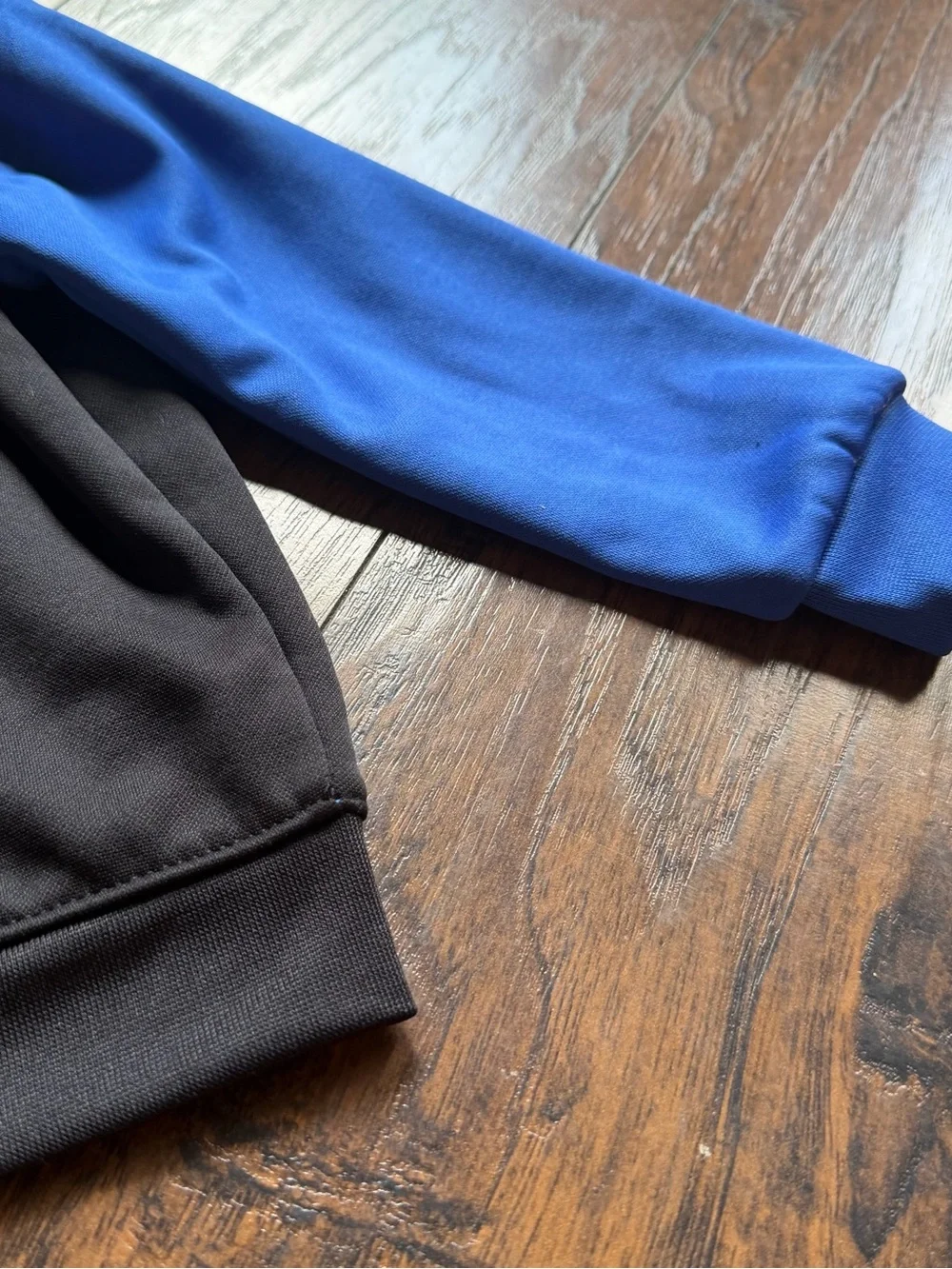 Nike Black Hoodie with Blue Sleeves and White Logo